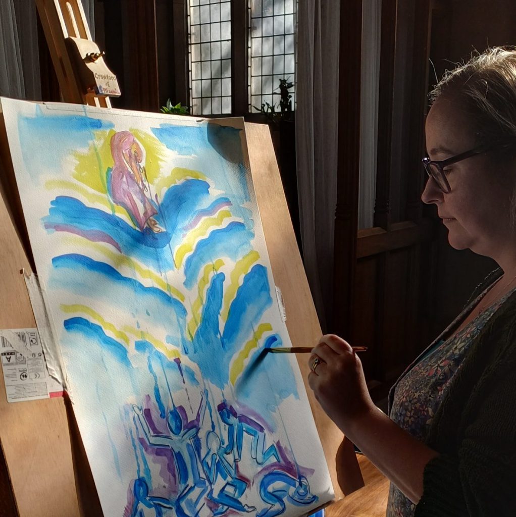 Image of a painting on an easel in a church